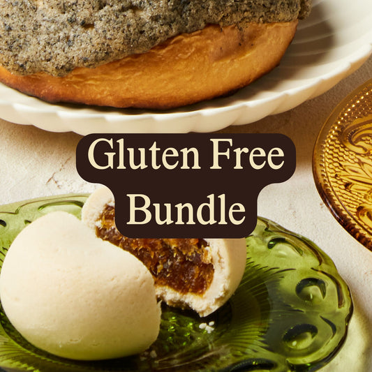 A selection of gluten-free baked goods including brownies, pineapple cakes, and cookies, with a label that reads 'Gluten Free Bundle'.